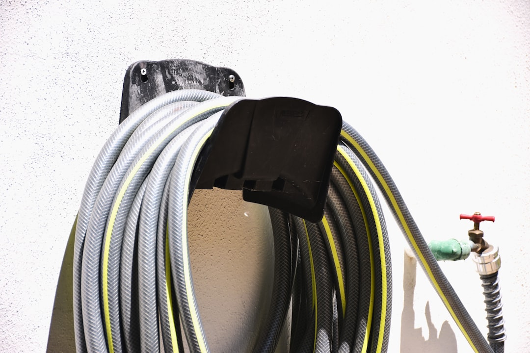 Victoria BC homeowner performing spring plumbing maintenance check